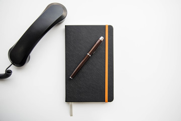 Notebook headphone on white background