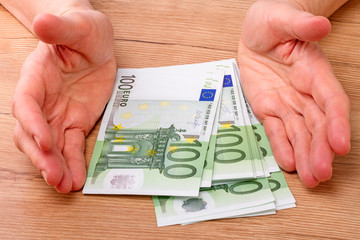 Hundred euro and hands
