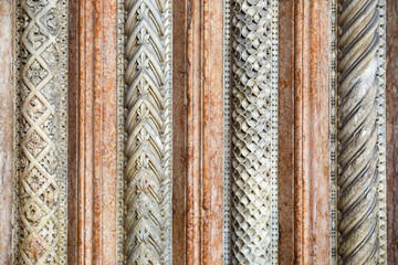 Stone sculptures on the exterior of the Cathedral in Modena (Ita