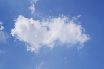 blue sky background with tiny clouds