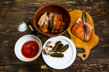 Still Life With grilled meat of turkey and salt salmon fillet