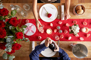 Overhead View Of Romantic Couple At Valentines Day Meal