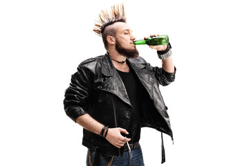 Punk rocker holding a cigarette and drinking beer