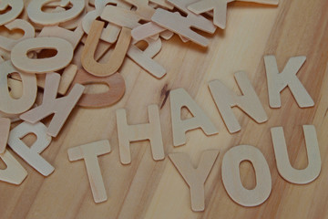 Word thank you made with wooden letters alphabet