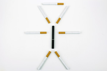 Cigarettes surrounding an e-cigarette to look like the outline of a person