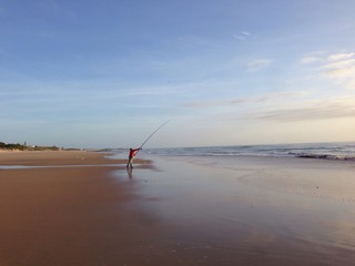 Pêcheur sur la plage