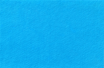 Fototapeta na wymiar Sky blue Felt Background for design. View from above. Close up.