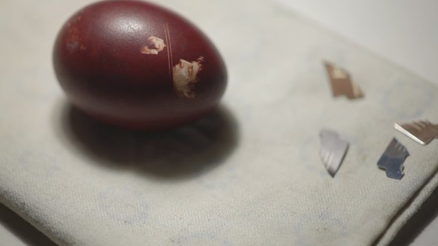 colored egg with rikunkom lays on fabric