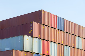 The stack of container in the ship yard at the port before export process