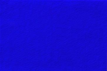 Fototapeta premium Bright blue Felt Background for design. View from above. Close up.