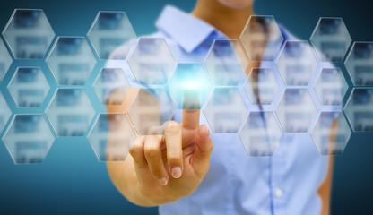 Businesswoman in his office using tactile interface
