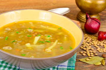 Healthy and Diet Food: Soup with Lentils, Celery and Sausage