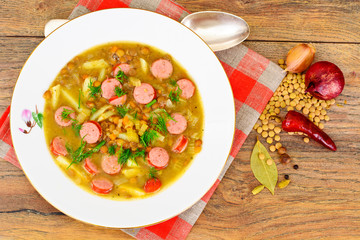 Healthy and Diet Food: Soup with Lentils, Celery and Sausage