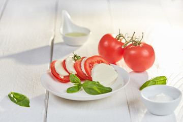 Sunshine on fresh summer salad caprese