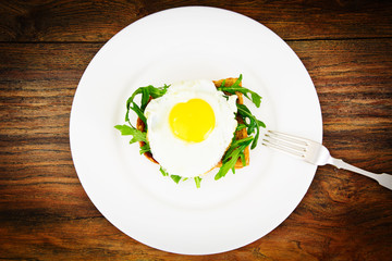 Scrambled Eggs with Arugula on Whole Grain Bread