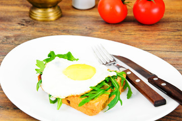 Scrambled Eggs with Arugula on Whole Grain Bread