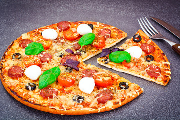 Pepperoni Pizza with Sausage, Cheese, Mozzarella, Olives and Bas