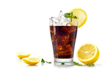 glass of cola or coke with ice cubes, slices of lemon and pepper