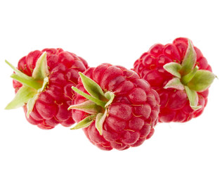 ripe raspberries isolated on white background close up