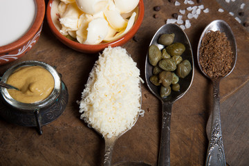 Set of ingredients for cooking on old wooden background