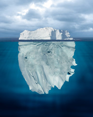 Mostly Underwater Iceberg Floating in Ocean