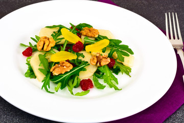 Dietary Delicious Salad on White Plate of Arugula, Par, Walnut a