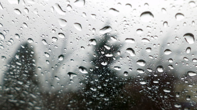 Raindrops on front glass of the car