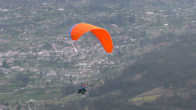 Experience the thrill of a solo paraglide flight over Patate City in Central Ecuador's Tungurahua Province.