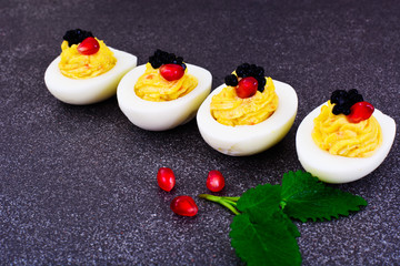 Tasty Stuffed Eggs with Pomegranate