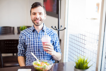 Latin man eating some healthy food
