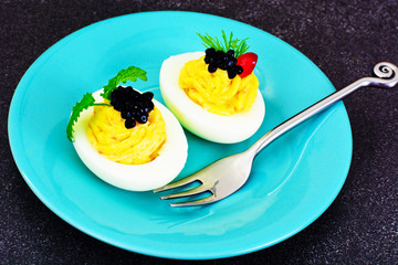 Tasty Stuffed Eggs with Pomegranate