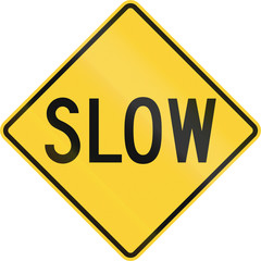 Road sign in the United States warning drivers to proceed slowly or slow down