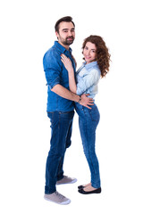 full length portrait of young beautiful cute couple isolated on