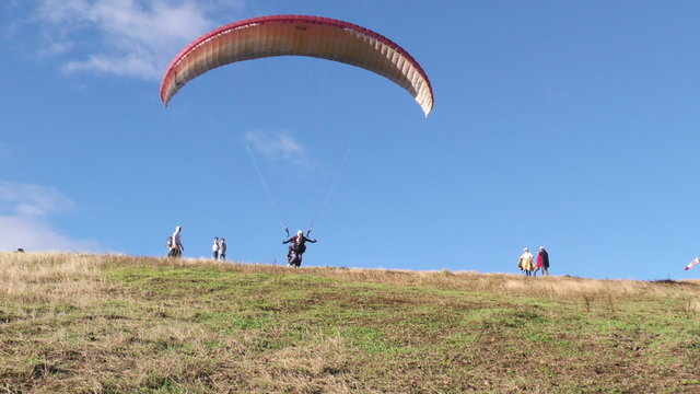 Experience the thrill of tandem paragliding takeoff,a must visit tourist attraction in Banos,Ecuador's Tungurahua province,on December 31,2015.