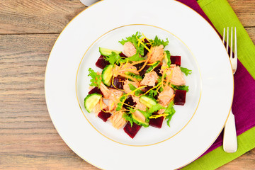 Salad with Beets, Salmon, Cucumber, Arugula, Lemon Zest, Orange,