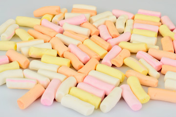 Sweets - Marshmallow on Woods Background.