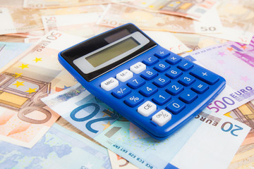 Calculator with Euro notes.  Budget Concept.  Money and calculat
