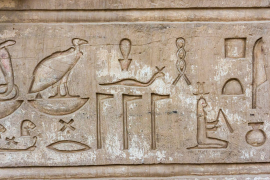 old egypt hieroglyphs.  Hieroglyphic carvings on the exterior wa
