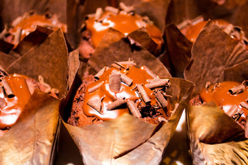 a lot of chocolate fondant in a basket
