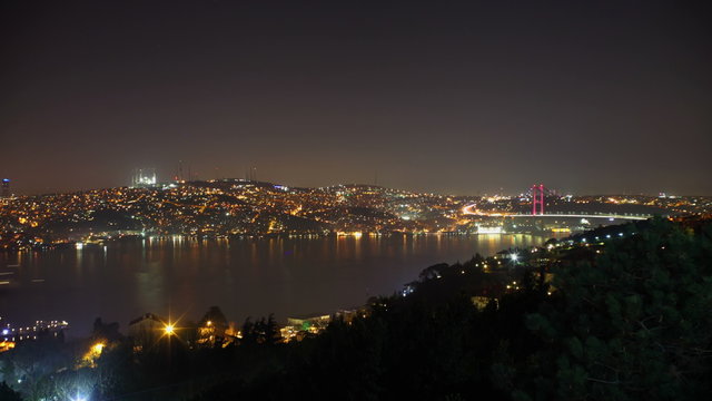 Evening view of the Bosphorus Bridge. The coast of the Bosphorus. Fatih Sultan Mehmet Bridge. Timelapse 4K - Stock Footage