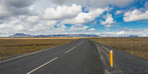 Isolated road and Icelandic colorful landscape at Iceland, summe