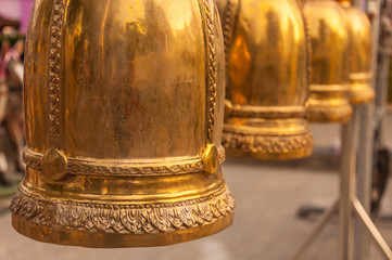 Fototapeta na wymiar multiple golgen bell in the temple