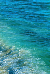 Fototapeta na wymiar Blue sea texture vertical image