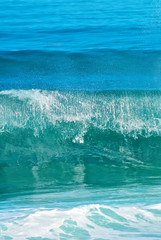 Fototapeta na wymiar Blue water wave abstract background vertical image