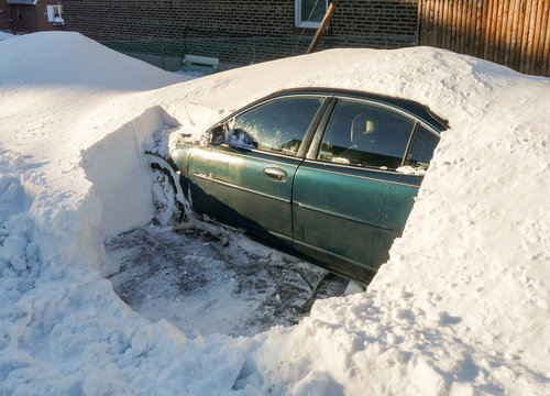 Snow Covered Car