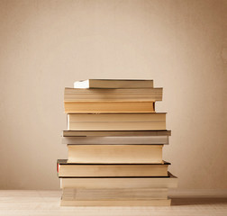 A stack of books with vintage background