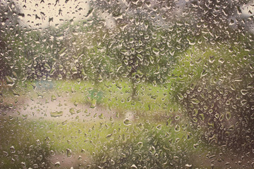 Vintage photo, Dripping down drops of rain on glass
