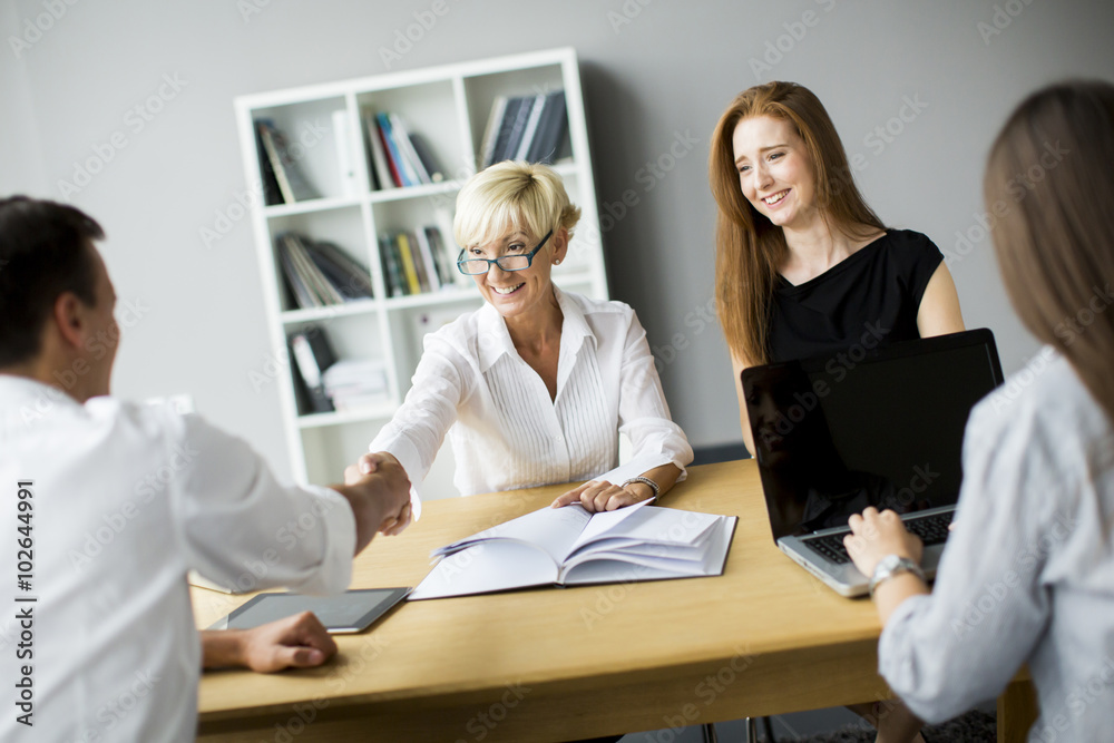 Wall mural successful group of business people working on plans