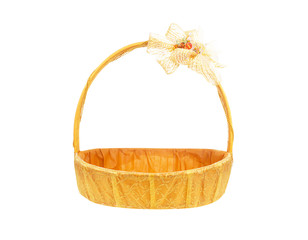 Obraz premium Gift baskets wrapped with a golden fabric and bow isolate on whi