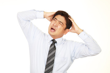 苦悩するビジネスマン